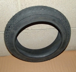 12" black wall tire